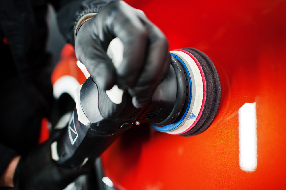 Car,Detailing,Concept.,Hands,Of,Man,With,Orbital,Polisher,In