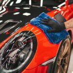 A,Man,Cleaning,Car,With,Cloth,,Car,Detailing,(or,Valeting)