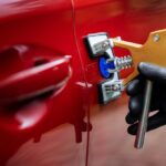 Paintless,Car,Dent,Repair,Tool.,Man,Fixing,Red,Vehicle,Door
