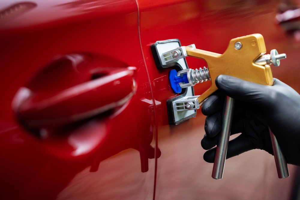 Paintless,Car,Dent,Repair,Tool.,Man,Fixing,Red,Vehicle,Door